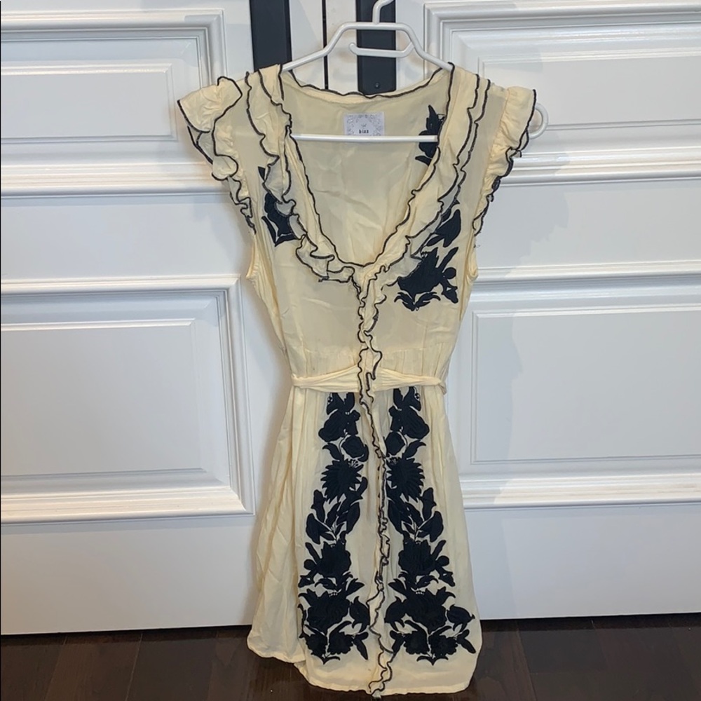 Cream and black dress